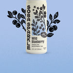 Sparklebuck Wild Blueberry sparkling buckwheat tea can on a light blue background