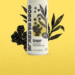 Sparklebuck Ginger Sparkling Buckwheat Tea can on a yellow background with black illustrations of ginger and buckwheat.